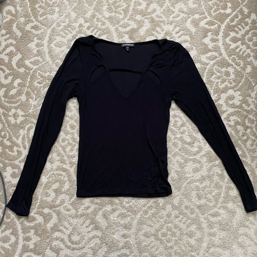Black V-neck sweater.